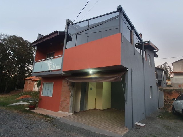 Casa à venda com 3 quartos, 100m² - Foto 2