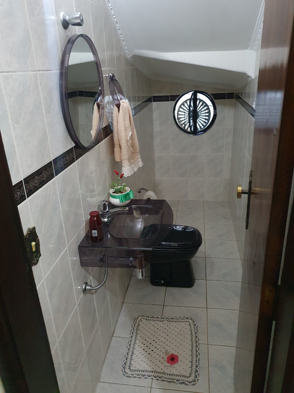 Casa à venda com 3 quartos, 242m² - Foto 11